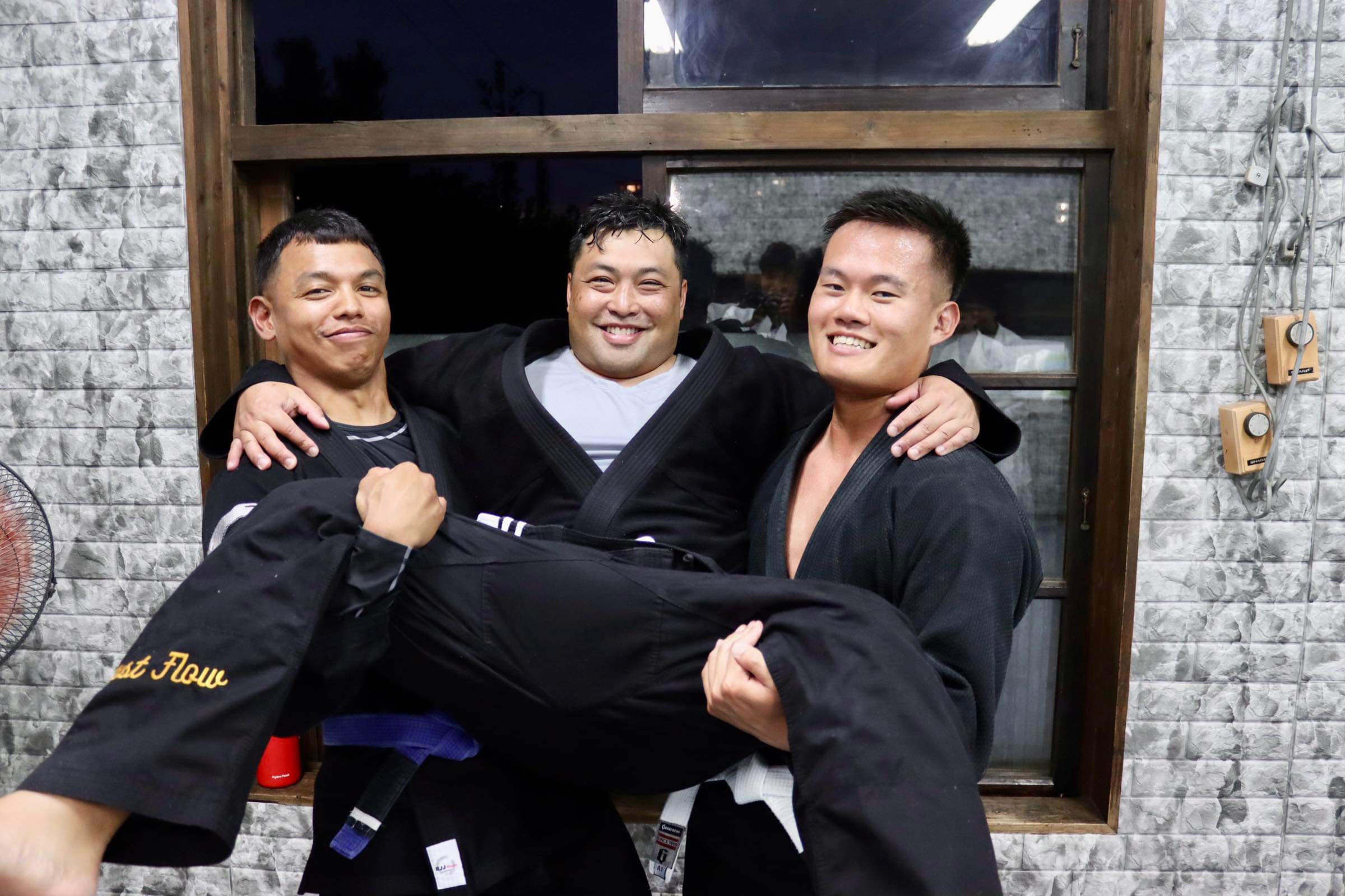 BJJ House Okinawa students together after training